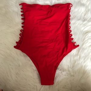 Red cheeky one piece red bathing suit
